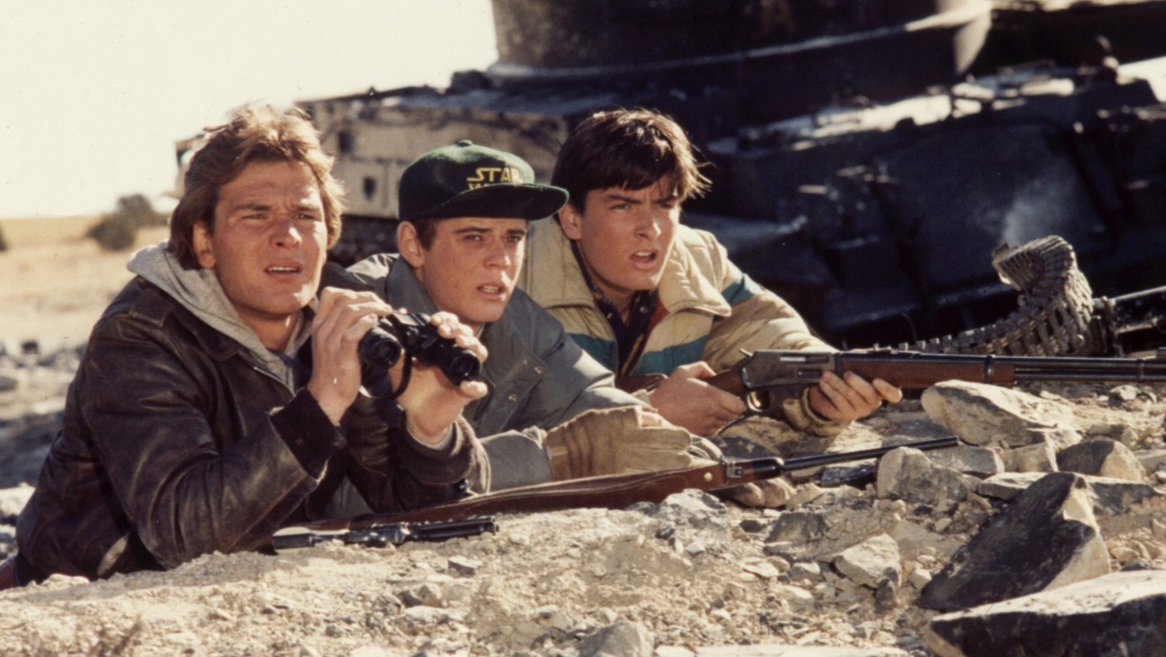 Patrick Swayze, C. Thomas Howell, and Charlie Sheen in Red Dawn (1984)