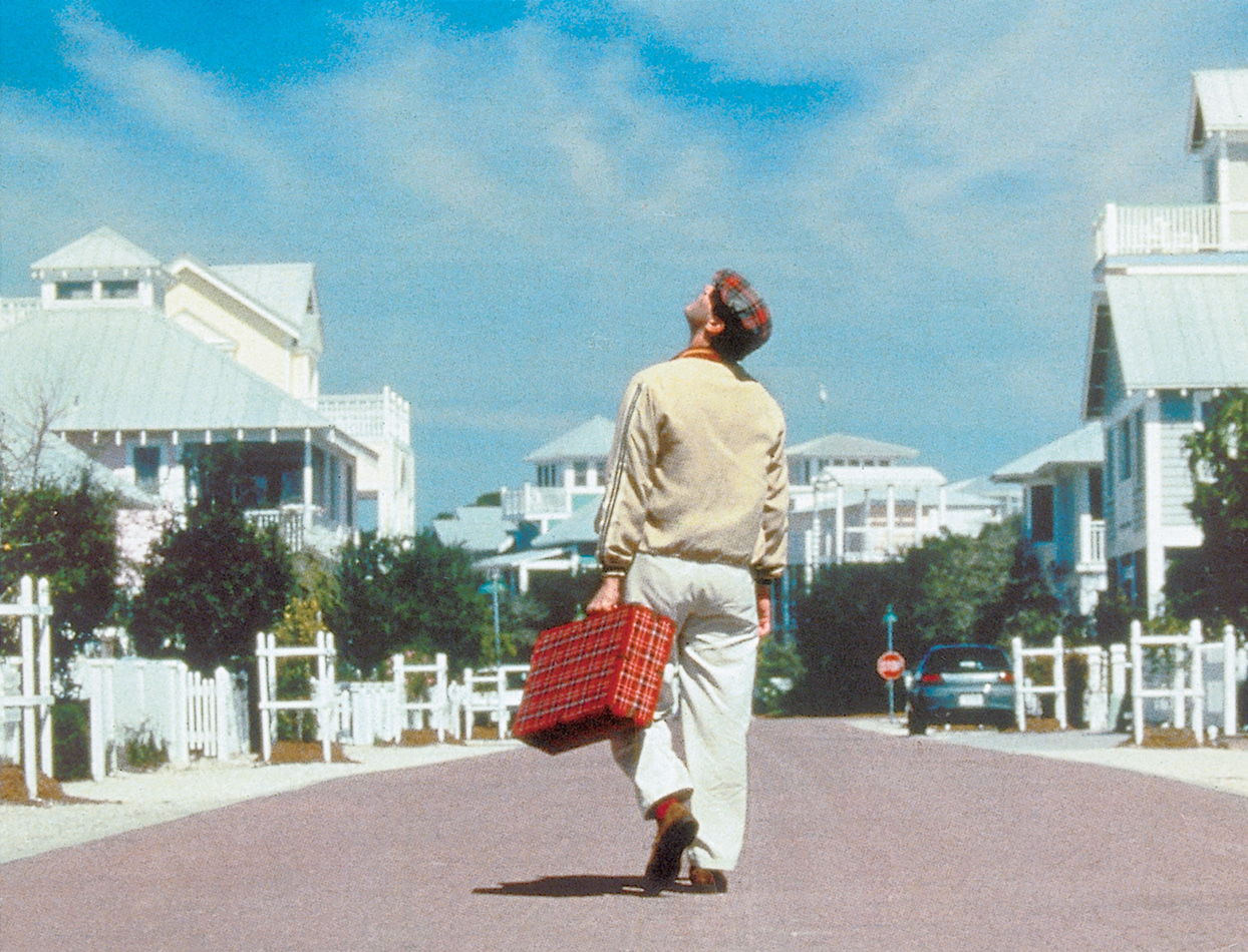 Jim Carrey on empty street in The Truman Show