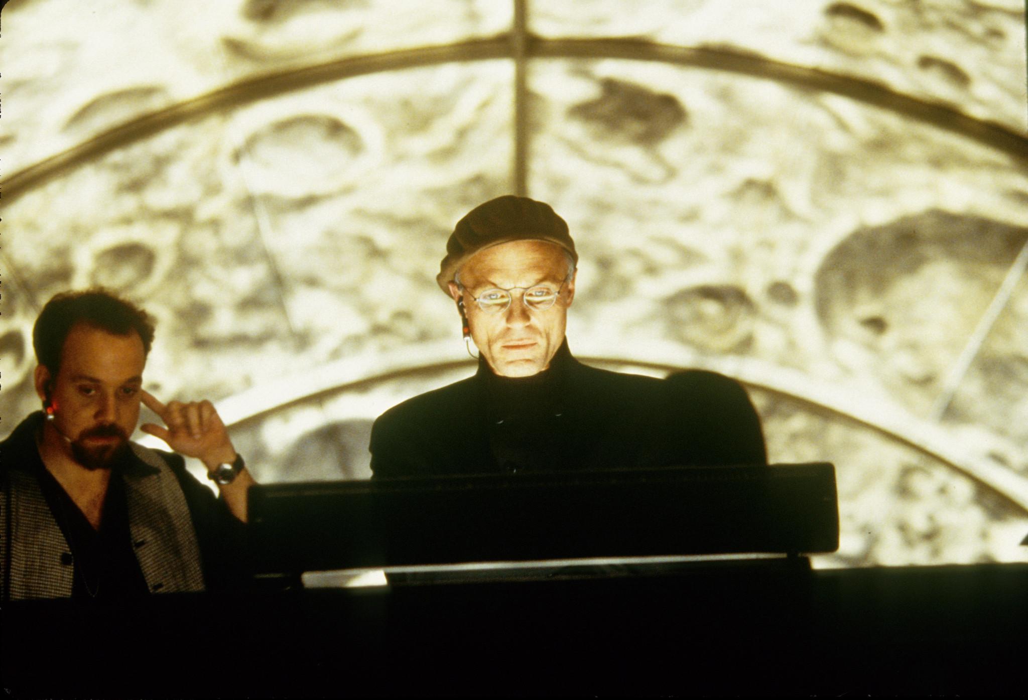 Ed Harris and Paul Giamatti in The Truman Show