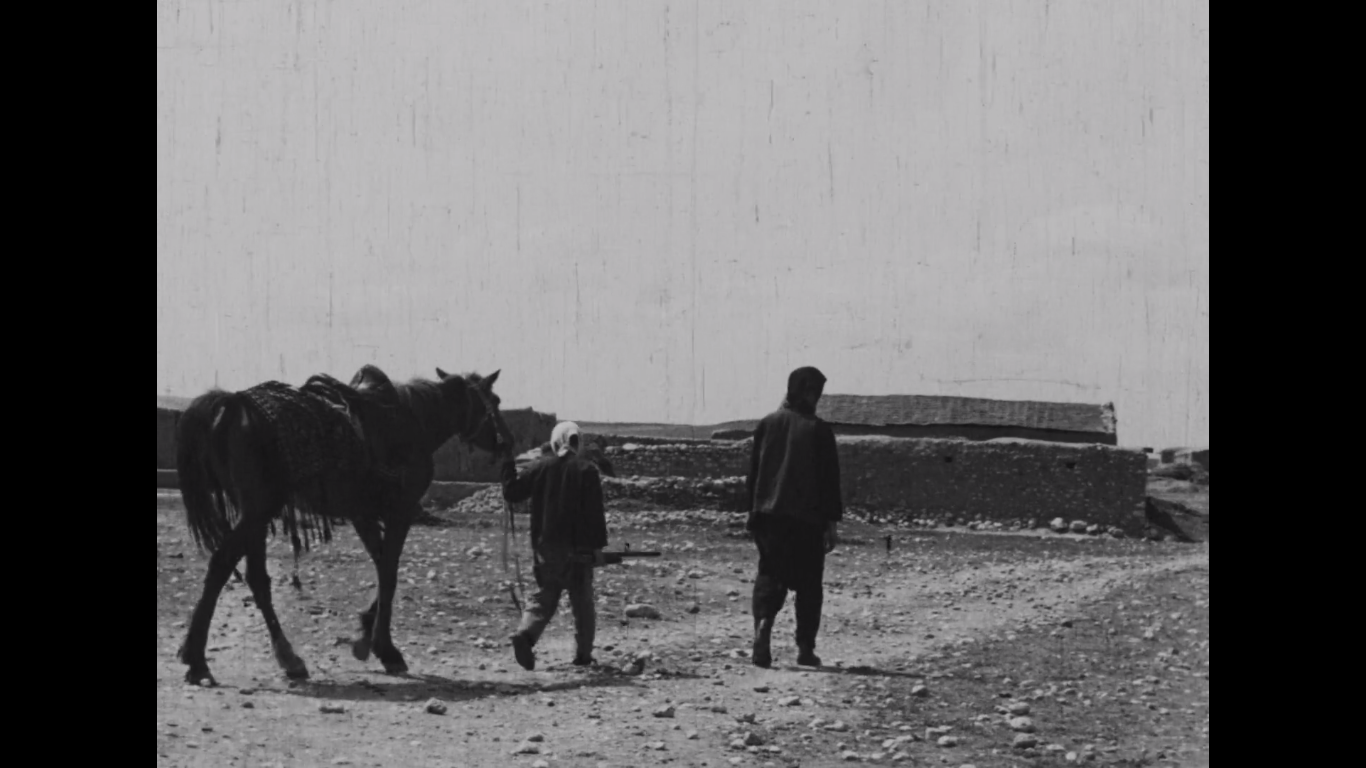 Yilmaz Güney and child in Lütfi Akad's Law of the Border